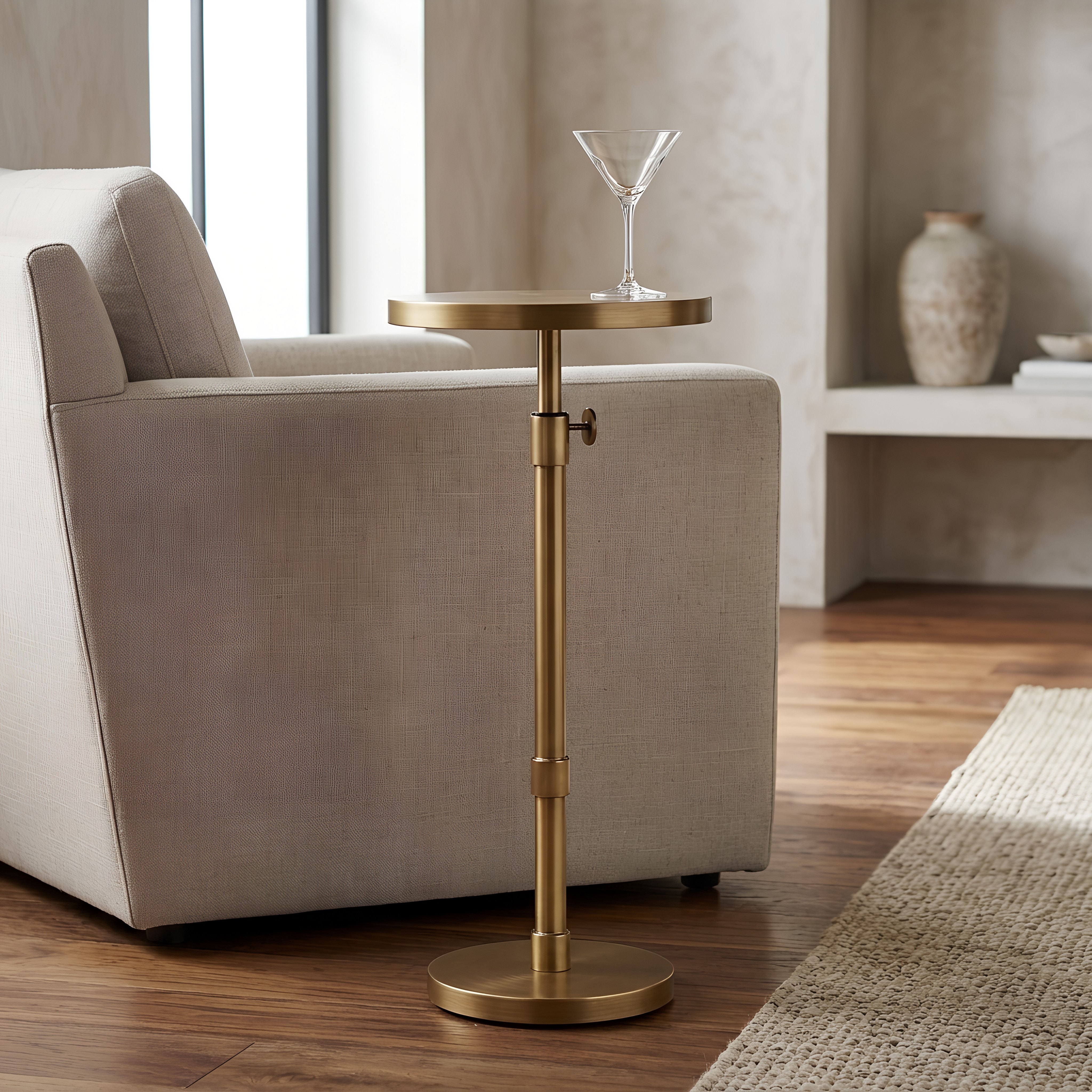 Metaire Round Antique Brass Accent Table with Adjustable Height Pedestal Base